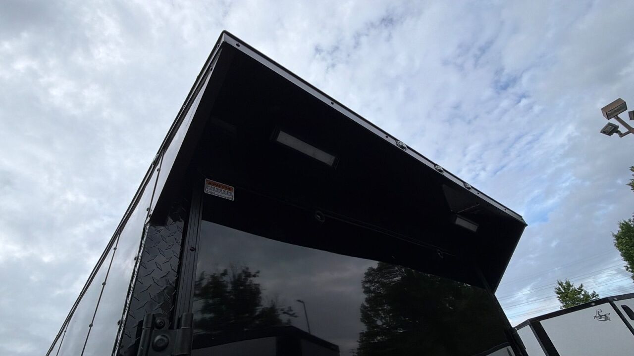 2026 Maximum 7x16 enclosed cargo trailer in black, photo 8
