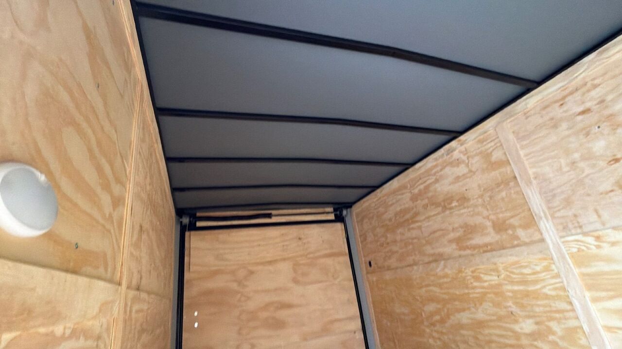 2026 Maximum 7x16 enclosed cargo trailer in black, photo 7