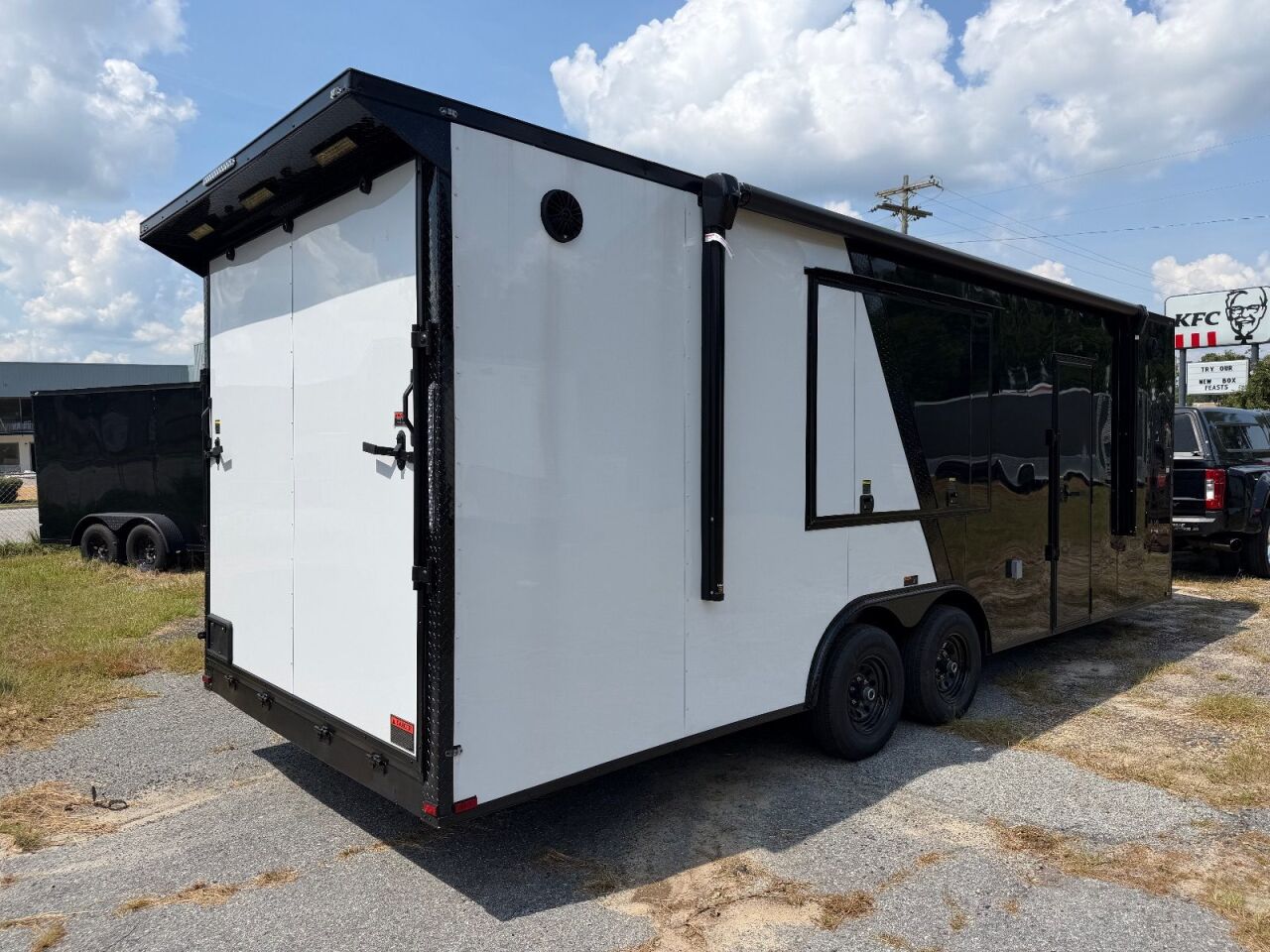 2026 Hook & Line 8.5x24 race car trailer in black, photo 2