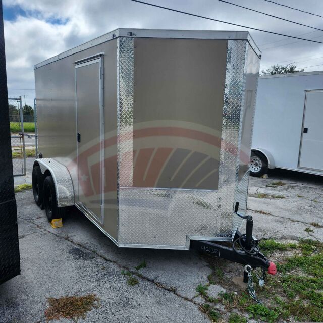 2026 Maximum 6x12 Tandem Axle enclosed cargo trailer in desert tan
