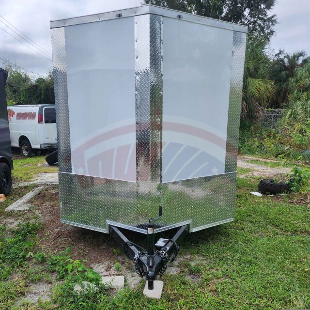 2026 J&C 7x12 Single Axle enclosed cargo trailer in white