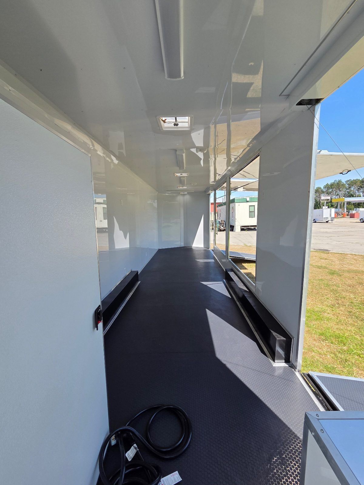 2025 Douglas Trailers Inc 8.5x34 concession / food trailer in white, photo 3