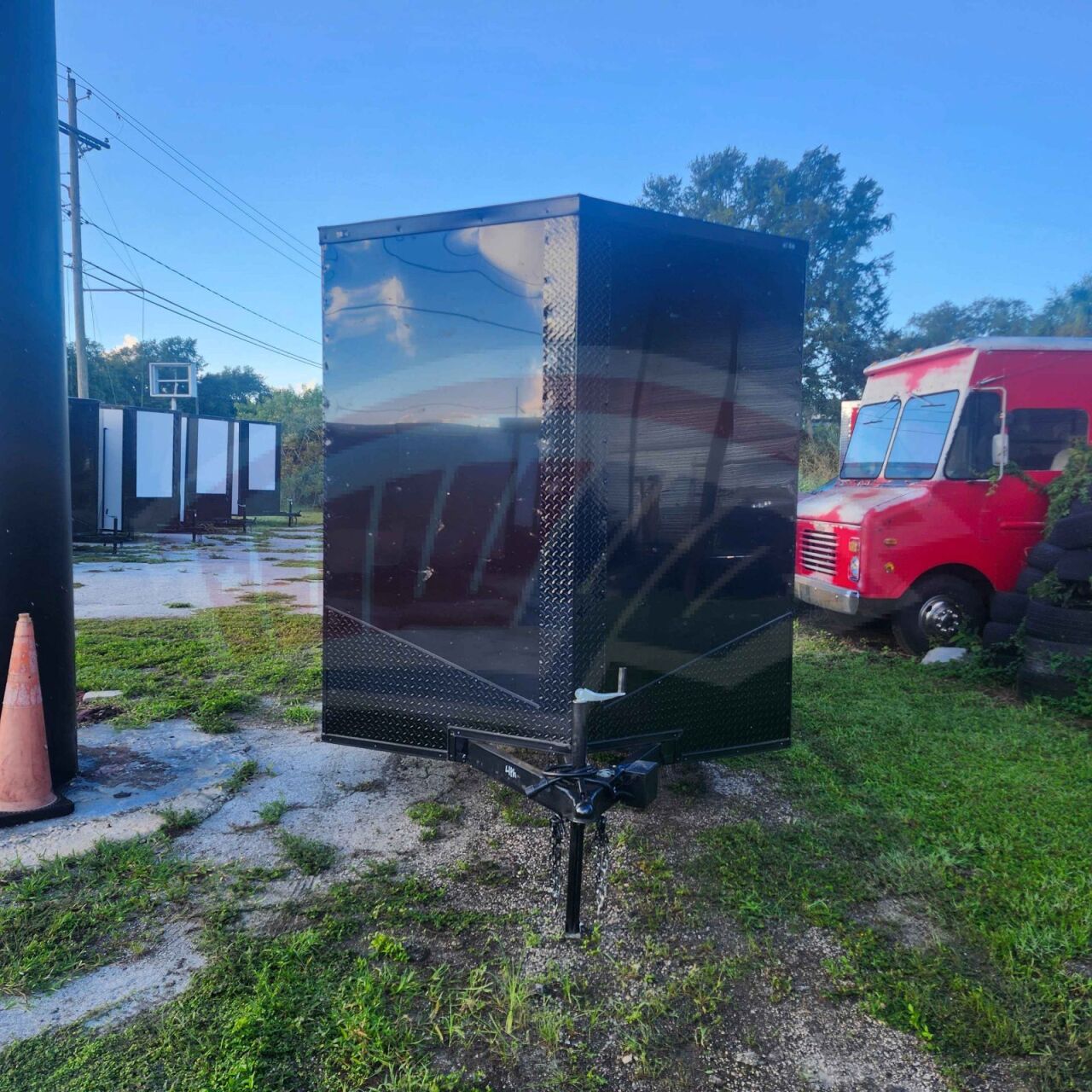 2027 Vision Cargo LLC 7x14 Tandem Axle enclosed cargo trailer in black, photo 2
